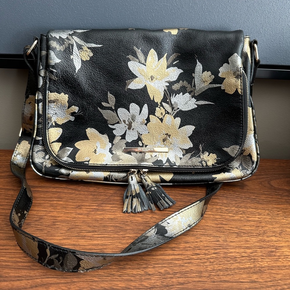 Black and Gold Crossbody Bag with Elegant Floral Design